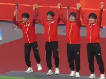 Japan's Men's Table Tennis Team Takes the Championship Podium
