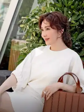 54-year-old Gigi Lai looks relaxed and at ease