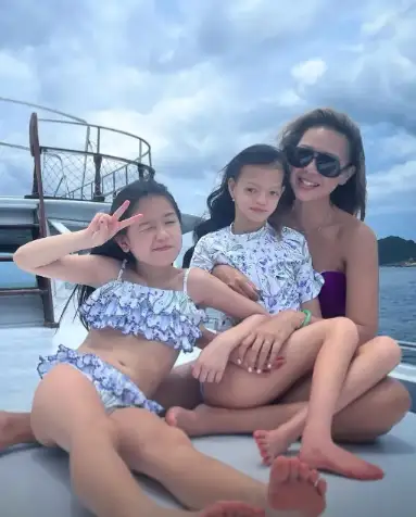 Chung Lai-ki Takes Care of Her Child